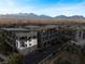 Highlighted residence showing the building's architectural design, balcony, and city views at 11441 Allerton Park Dr # 212, Las Vegas, NV 89135
