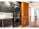 Laundry room featuring modern stacked washer and dryer at 11441 Allerton Park Dr # 212, Las Vegas, NV 89135