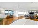 Main bedroom with a view and wood floors open to a living area at 11441 Allerton Park Dr # 212, Las Vegas, NV 89135