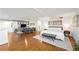 Open concept main bedroom and living room with wood flooring and modern decor at 11441 Allerton Park Dr # 212, Las Vegas, NV 89135