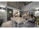 Open patio with outdoor dining, seating and access to the indoor stairs at 11441 Allerton Park Dr # 212, Las Vegas, NV 89135