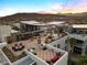 Aerial view of the community showcasing a large rooftop patio with mountain views at 11441 Allerton Park Dr # 212, Las Vegas, NV 89135