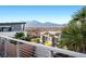 Scenic view from a balcony overlooking a vibrant community and stunning mountain range at 11441 Allerton Park Dr # 212, Las Vegas, NV 89135