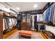Spacious walk-in closet with custom shelving, drawers, and organization at 11441 Allerton Park Dr # 212, Las Vegas, NV 89135