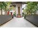 Charming walkway leading to a building's entrance with a decorative water feature at 11441 Allerton Park Dr # 212, Las Vegas, NV 89135