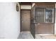 View of the front door with a security screen and house number 247 at 1405 Vegas Valley Dr # 247, Las Vegas, NV 89169