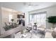 Inviting open-concept living room with ceiling fan and access to the dining area and kitchen at 1405 Vegas Valley Dr # 247, Las Vegas, NV 89169