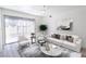 Bright living room with a ceiling fan, slider and modern furnishings at 1405 Vegas Valley Dr # 247, Las Vegas, NV 89169