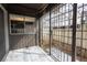 Outdoor patio area featuring tile flooring and security gate at 1405 Vegas Valley Dr # 247, Las Vegas, NV 89169