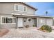 Charming front entryway with desert landscape and a decorative security door at 1812 Renada Cir, North Las Vegas, NV 89030