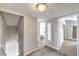 Hallway featuring access to bedrooms and stairway down to the first floor at 1812 Renada Cir, North Las Vegas, NV 89030