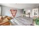 Spacious living room with lots of natural light and a decorative heart wall fixture at 1812 Renada Cir, North Las Vegas, NV 89030
