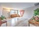 Spacious and bright living room featuring light wood floors and trendy decor at 1812 Renada Cir, North Las Vegas, NV 89030