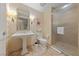 Elegant bathroom featuring a spacious walk-in shower and pedestal sink at 2000 N Fashion Show Dr # 3307, Las Vegas, NV 89109