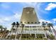 Stunning exterior view of a Trump International building with palm trees at 2000 N Fashion Show Dr # 3307, Las Vegas, NV 89109