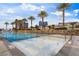 Resort-style pool surrounded by palm trees and city skyline views at 2000 N Fashion Show Dr # 3307, Las Vegas, NV 89109