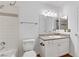 Well-lit bathroom features granite countertop vanity and shower/tub combination at 2120 Ramrod Ave # 1318, Henderson, NV 89014