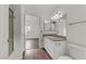 Bathroom showcasing a sink and granite countertops with a view to a bedroom at 2120 Ramrod Ave # 1318, Henderson, NV 89014