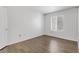 Bedroom with window for natural light and modern, wood-look flooring at 2120 Ramrod Ave # 1318, Henderson, NV 89014