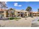 Beautiful condo building exterior showcasing well-maintained landscaping and architectural details at 2120 Ramrod Ave # 1318, Henderson, NV 89014