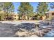 Outdoor community area with green landscaping, perfect for relaxing and socializing at 2120 Ramrod Ave # 1318, Henderson, NV 89014
