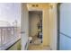 Outdoor patio leading to storage area, featuring a convenient water heater at 2120 Ramrod Ave # 1318, Henderson, NV 89014