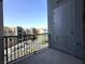 Balcony view of the city with railing, buildings, and street at 26 E Serene Ave # 412, Las Vegas, NV 89123