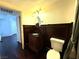 Bathroom featuring decorative wood paneling and classic fixtures at 26 E Serene Ave # 412, Las Vegas, NV 89123