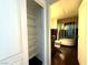 En suite bathroom featuring a modern steam shower, a toilet, and custom cabinets at 26 E Serene Ave # 412, Las Vegas, NV 89123