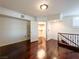 Bedroom with hardwood floors, large closet, white walls, crown molding, and natural light from windows at 26 E Serene Ave # 412, Las Vegas, NV 89123