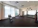 Well-lit gym featuring free weights, exercise machines, and large windows for a motivating workout environment at 26 E Serene Ave # 412, Las Vegas, NV 89123
