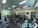 Well-equipped gym with weight machines, free weights, and ample natural light at 26 E Serene Ave # 412, Las Vegas, NV 89123