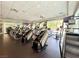 Well-equipped gym featuring modern treadmills and stair climbing machines with abundant natural light and mounted televisions at 26 E Serene Ave # 412, Las Vegas, NV 89123