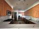 Stylish kitchen featuring stainless steel appliances, quartz countertops, and ample cabinetry at 26 E Serene Ave # 412, Las Vegas, NV 89123