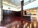 Bright living room featuring built-in bookcase, high ceilings, and open floor plan at 26 E Serene Ave # 412, Las Vegas, NV 89123