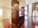 Elegant living room with custom built-ins, hardwood floors, and a wine storage at 26 E Serene Ave # 412, Las Vegas, NV 89123