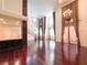 Spacious living room with high ceilings, hardwood floors, and elegant chandelier at 26 E Serene Ave # 412, Las Vegas, NV 89123