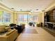 Comfortable lounge area with stylish seating arrangements and plenty of natural light from large windows at 26 E Serene Ave # 412, Las Vegas, NV 89123