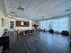 Spacious lounge area with modern furniture, a large TV, and elegant curtains at 26 E Serene Ave # 412, Las Vegas, NV 89123