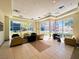 Bright and airy lounge featuring comfortable seating, large windows, and neutral tones for a relaxing atmosphere at 26 E Serene Ave # 412, Las Vegas, NV 89123