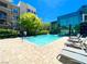 Beautiful community pool and lounge chairs perfect for relaxing at 26 E Serene Ave # 412, Las Vegas, NV 89123