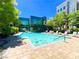 Community pool area with lounge chairs and inviting blue water for residents at 26 E Serene Ave # 412, Las Vegas, NV 89123
