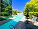 Lap pool and chaise lounges, perfect for relaxation and recreation at 26 E Serene Ave # 412, Las Vegas, NV 89123