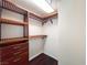 Walk-in closet with custom shelving, drawers, and storage solutions at 26 E Serene Ave # 412, Las Vegas, NV 89123