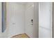 Entryway with tile flooring, featuring two white interior doors and one exterior door at 2831 Geary Pl # 2912, Las Vegas, NV 89109
