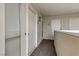 Hallway area featuring neutral walls and flooring and multiple entry doors at 2831 Geary Pl # 2912, Las Vegas, NV 89109