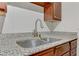 Close-up of the modern kitchen sink, faucet, and countertops, showcasing the functionality and design at 2831 Geary Pl # 2912, Las Vegas, NV 89109