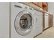 Close-up of the in-unit, side-by-side washer and dryer, conveniently located in the kitchen at 2831 Geary Pl # 2912, Las Vegas, NV 89109