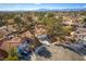 An aerial view of the home showcases its location in a tree-filled neighborhood at 2917 Chapala Dr, Las Vegas, NV 89120