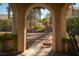 The backyard can be seen through an archway at 2917 Chapala Dr, Las Vegas, NV 89120